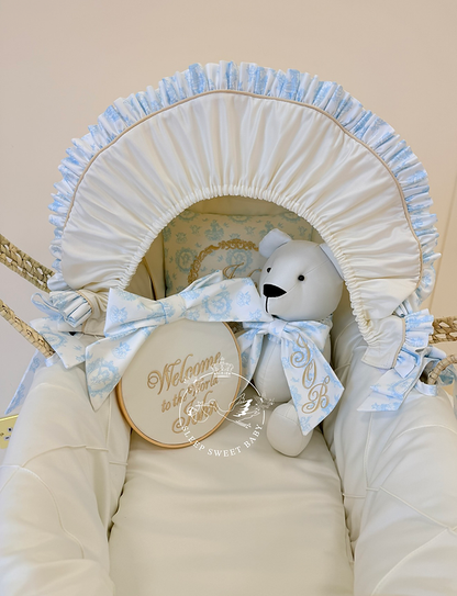 Hooded Moses Basket and bedding